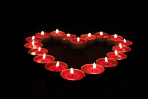 Common ingredients like candles and herbs in Voodoo love spells