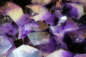 The picture shows amethyst - a stone used in love spells.