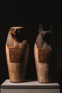 The illustration shows 2 Egyptian sculptures.